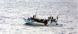 Refugies_on_a_boat.jpg